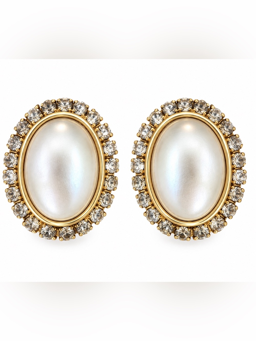 Vintage statement clip-on earrings featuring oversized oval faux pearl cabochon